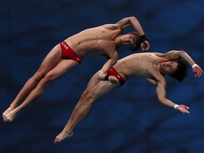 Team Canada's Rylan Wiens and Nathan Zsombor-Murray compete in the men's synchronized 10m platform final on day three of the 2022 FINA World Championships in Budapest at Duna Arena on June 28, 2022 in Budapest, Hungary.