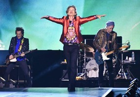 (From L) Members of the Rolling Stones Ronnie Wood, Mick Jagger and Keith Richards during their concert as part of their European tour, in Madrid on June 1, 2022.