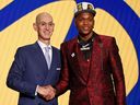 Bennedict Mathurin (Arizona) shakes hands with NBA commissioner Adam Silver after being selected as the No. 6 overall pick by the Indiana Pacers in the first round of the 2022 NBA Draft at Barclays Center in Brooklyn, N.Y., on Thursday, June 23, 2022.