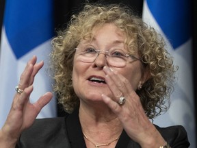 Quebec's minister responsible for seniors and informal caregivers, Marguerite Blais, responds to reporters during a press conference on February 16, 2022.