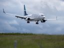 A WestJet flight from Calgary arrives at Halifax Stanfield International Airport in Enfield, N.S. on Monday, July 6, 2020. 