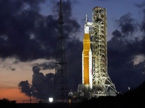 The NASA Artemis rocket with the Orion spacecraft aboard is seen on pad 39B just after sunset at the Kennedy Space Center on June 27, 2022, in Cape Canaveral, Fla.