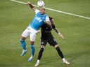 CF Montréal defender Joel Waterman, right, is challenged by Charlotte FC forward Daniel Rios during first half MLS soccer action in Montreal at Saputo Stadium on Saturday, June 25, 2022 .