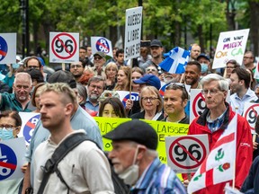 Montrealers gathered at Place Du Canada in May 2022 to protest against Bill 96. A new poll suggests support for the law is still divided along linguistic lines.