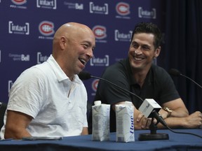 MONTREAL, QUE.: JULY 4, 2022 -- Montreal Canadiens general manager Kent Hughes and Vincent Lecavalier, the club's special adviser for hockey operations, share a laugh at a news conference ahead of the NHL Draft Thursday at the Bell Center.  This was at the Bell Sports Complex in Brossard, south of Montreal, on Monday, July 4, 2022.