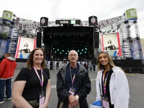 Carol Shore, the mother of musician Stacey Ryan, her father Gary Ryan and her sister Jessica Ryan wait for Stacey to take the stage in Montreal on Tuesday, July 5, 2022.