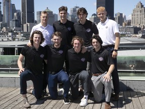 Top would be picks for the upcoming 2022 NHL draft, stand in front of the city's skyline on Wednesday July 6, 2022. From L to R on back row: Joakim Kemell, Juraj Slafkovsky, Cutter Gauthier and Nathan Gaucher. L to R bottom row: Conor Geekie, Shane Wright, Logan Cooley and Matthew Savoie.
