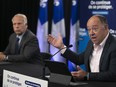 Health Minister Christian Dubé, right, and Quebec public health director Dr. Luc Boileau deliver an update on COVID-19 Thursday at a press conference in Montreal.