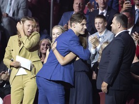 Juraj Slafkovsky and his family react as the Canadiens pick him as their first draft choice in Montreal on Thursday, July 7, 2022.