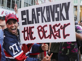 Pierre-Marc Pelletier was overjoyed when the Montreal Canadiens announced Juraj Slafkovsky as the the first pick in NHL draft in Montreal Thursday, July 7, 2022. Other fans around him were more subdued, as many were hoping and expecting Shane Wright to be chosen.