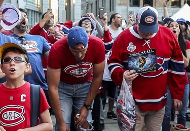 Gerard O'Toole (right) and Jesse Bourget showed disappointment  when the Montreal Canadiens announced Juraj Slafkovsky as the the first pick in NHL Draft in Montreal Thursday, July 7, 2022. They were both hoping for Shane Wright to be chosen first.