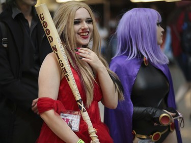 Amanda Samario (left)  as Harley Quinn of Suicide Squad and Kaily Mountain as Raven from Teen Titans at the Montreal Comiccon.