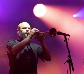 Trumpeter Dave Guy performs during the Roots closing concert at the Montreal Jazz Festival on Saturday, July 9, 2022.