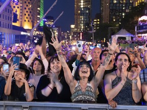 The crowd cheers as the Roots close out the jazz festival on July 9, 2022.