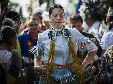 Valerie Gabriel of Kanesatake and others take part in the Retreat Dance at the 30th edition of the Echoes of a Proud Nation Pow-Wow in Kahnawake on Sunday, July 10, 2022.