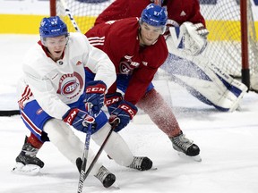 Owen Beck, bottom, and Joshua Roy, during the Montreal Canadiens' development camp at the Bell Sports Complex in Brossard on July 11, 2022.