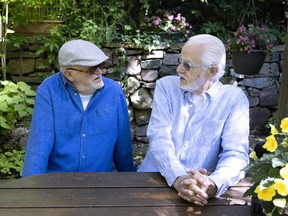 Roger Thibault and Theo Wouters at their home, in Montreal on Friday, July 15, 2022.