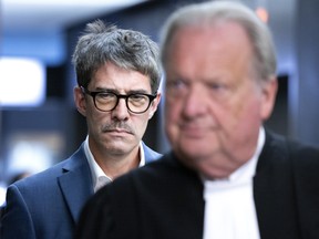 Former Parti Québécois leader André Boisclair arrives for sentencing at the Montreal Palace of Justice on Monday, July 18, 2022.