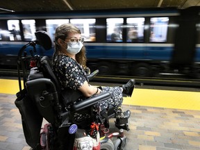 Marie-Eve Veilleux can access the Mont-Royal métro train platform in her wheelchair for the first time.