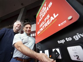 Machines in venues hosting Just for Laughs shows enable patrons to donate $2 to $20 to the Welcome Hall Mission with a simple tap. “Mental health is a particularly close cause amongst artists and comedians in our industry,” says Just for Laughs/Juste pour rire Group CEO Charles Décarie, right, with Welcome Hall Mission CEO Sam Watts at Place des Arts.