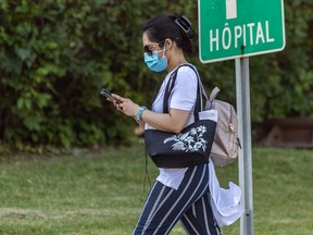 A worker leaves the Montreal General Hospital in Montreal on Thursday July 21, 2022.
