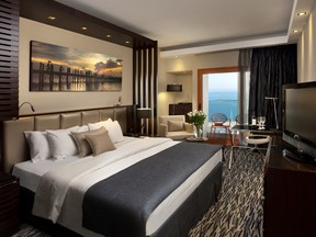 Many rooms at the Carlton Tel Aviv — including the pictured executive king room — have balconies with views of the Mediterranean.