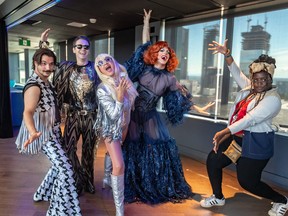 Duke Lebeau, left, J.B. Da Silva, Stardust, Gisèle Lullaby and Mags help raise the curtain on the programming for Montreal Pride at the Hotel Fairmont The Queen Elizabeth on Tuesday, July 26, 2022.