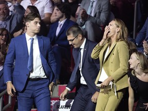 uraj Slafkovsky and his mother react as the Montreal Canadiens pick Slafkovsky as their 1st draft choice during the NHL draft in Montreal on Thursday, July 7, 2022. (Allen McInnis / MONTREAL GAZETTE)