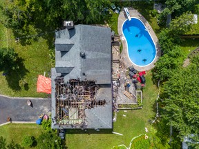 A house in Beaconsfield belonging to Vassos Vasiliou and his wife, Jennifer, caught fire after being struck by lightning Thursday afternoon. Firefighters were able to contain the blaze, but fire and water damage mean the house will probably need to be torn down and rebuilt.