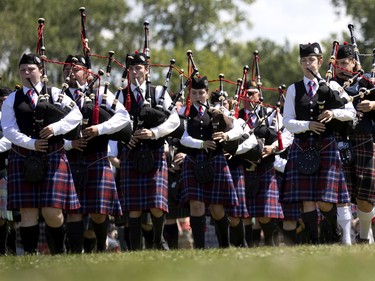 Pipe bands from across Canada and the U.S. take part in the opening ceremonies at the Montreal Highland games in Montreal on Sunday, July 31, 2022.