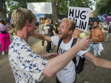 Jean-Philippe Marier opens his arms wide, and records the hug with a device in his left hand, as Jacob Johnson of Sarnia and attendee of the Osheaga Festival rushes to him. Marier is the founder of HUG4LOVE and has a goal to improve everyone's mental wellness. This was on Day 3 of the Osheaga festival at Jean-Drapeau Park in Montreal Sunday, July 31, 2022.