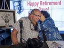 Dave Fisher gets a hug and kiss from his wife, Ardy, after signing off for his final CJAD show in 2016.