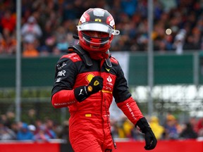 Pole position qualifier Carlos Sainz of Spain and Ferrari celebrates in parc ferme during qualifying ahead of the F1 Grand Prix of Great Britain at Silverstone on July 02, 2022 in Northampton, England.
