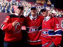 Simon Nemec, left, of the New Jersey Devils, with Montreal Canadiens' Juraj Slafkovsky and Filip Mesar during the NHL draft at the Bell Centre in Montreal on July 7, 2022.