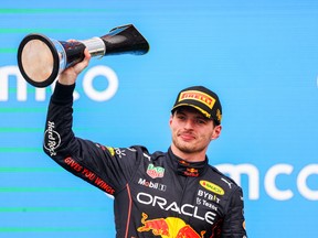 Max Verstappen of Red Bull Racing and The Netherlands celebrates finishing in first position during the F1 Grand Prix of Hungary at Hungaroring on July 31, 2022 in Budapest, Hungary.
