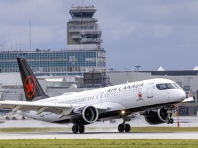 An Air Canada Airbus A220-300 jet lands at Montréal-Pierre Elliott Trudeau International Airport in Dorval 2022.