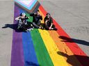 Rainbow crosswalks painted outside Calgary schools in 2021.