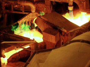 Molten copper is poured into molds on a 16-place turntable at the Horne copper smelter in Rouyn-Noranda in 2006.