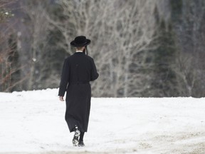 A member of the ultra-orthodox Jewish sect Lev Tahor in Ste-Agathe-des-Monts in 2013.