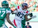 Montreal Alouettes receiver Eugene Lewis carries the ball against the Saskatchewan Roughriders in Regina on July 2, 2022.