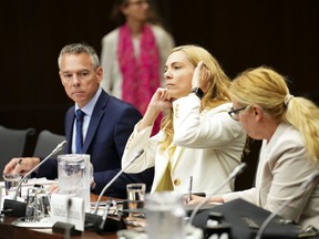Michel Ruest, a senior director of Sport Canada, Pascale St-Onge, the federal minister of sport, and Isabelle Mondou, right, the deputy minister of Canadian Heritage, appear this week at a House of Commons committee looking into the Hockey Canada controversy.