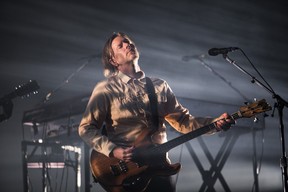Bassist Tim Kingsbury of the Montreal band Arcade Fire performs on Day 1 of the Osheaga festival at Parc Jean-Drapeau in Montreal Friday, July 29, 2022.