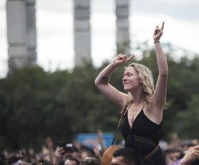 The crowd enjoys the music of Sebastien Leger on Day 2 of the Osheaga festival at Parc Jean-Drapeau on July 30, 2022.