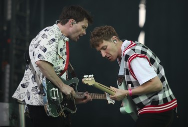 Drew MacFarlane (left) and Dave Bayley of the band Glass Animals perform on day 3 of the Osheaga festival at Parc Jean-Drapeau on July 31, 2022.