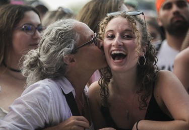 Pam Stimpson showed her love for her daughter Sophie as the pair from New Hampshire waited for Machine Gun Kelly on the final day of Osheaga 2022. They staked out their position in the very front over seven hours before the start of the 8:20 p.m. show.
