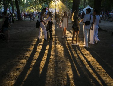 The sun sets on the last day of the Osheaga festival at Parc Jean-Drapeau on July 31, 2022
