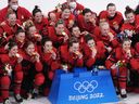 Members of the most recent Canadian women's Olympic and world championship team put pen to paper on Monday to express their dismay and demand full transparency from Hockey Canada.