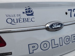 A Quebec City police car is seen in Quebec City, Friday, Dec. 3, 2021.