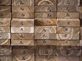 Cedar planks are stacked at a lumber yard in Montreal, Tuesday, April 25, 2017. The Paper Excellence Group has signed a deal to buy Resolute Forest Products Inc. in an agreement that values the company at US$2.7 billion.