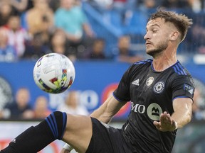 CF Montreal’s Djordje Mihailovic (8) lunges for the ball during first half MLS soccer action against New York City FC in Montreal, Saturday, July 30, 2022.